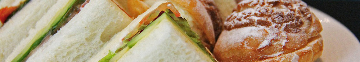 Eating Sandwich Vietnamese Bakery at Top Baguette restaurant in Westminster, CA.